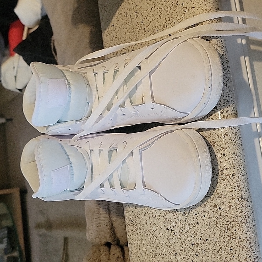 High top all white Nike sneakers